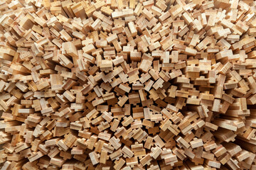 wooden slats stacked on a pile