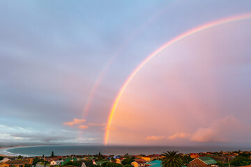Rainbow over the sea at Jeffreys Bay