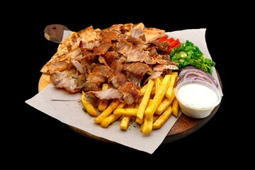Isolated / Transparent Greek / Arabic Lamb Donner Kebab Meat with Fries / Chips Tzatziki Salad Tomatoes Onions Lettuce