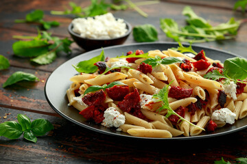 Chorizo, Penne pasta with creamy ricotta cheese and greens