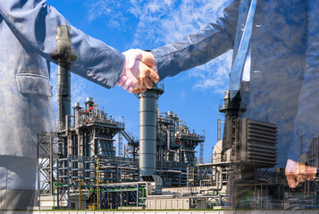 Double exposure of businessman standing handshake on outdoors and gas turbine electric power plant...