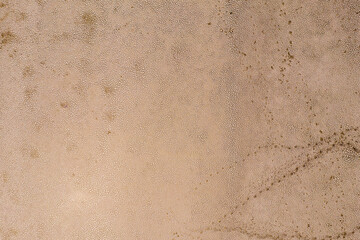Dry lake bed with cracked Soil, Aerial view.