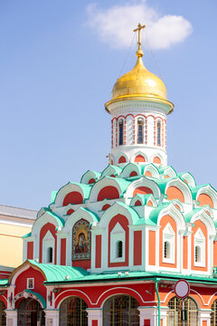 View of Cathedral of Our Lady of Kazan (or Kazan Cathedral). It's a Russian Orthodox church located on the northeast corner of Red Square in Moscow. Blue sky.