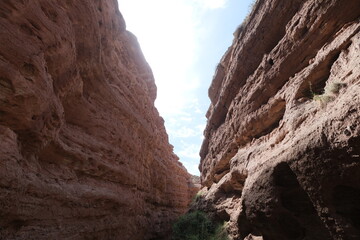 low angle view between ember color canyon rocks under sunshine. in Zhangye, Gansu province China.