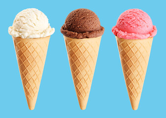 Ice cream scoops in cones with chocolate, vanilla and strawberry on blue background.