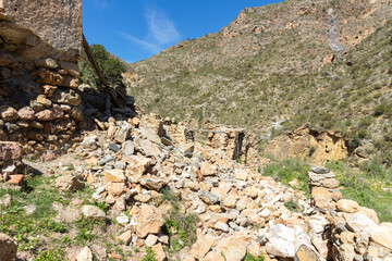ruined farmhouse in a mountainous area
