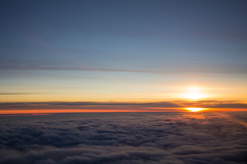 Fototapeta na wymiar sunset above the clouds