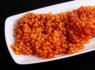 Raw Salmon Roe with Membranes Prepared for Curing.