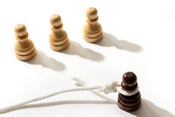 Black pawn with a hangman's loop on a neck