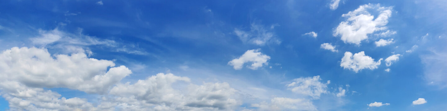 Panorama sky with beautiful cloud on a sunny day. Panoramic high resolution image.