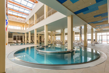 Indoor swimming pool in hotel spa and wellness center