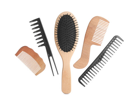 Set of professional hair combs and brush isolated on white, top view