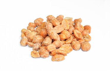 Pile of peanuts with chilli isolated on white background. Marinated and salted nuts chili snack food