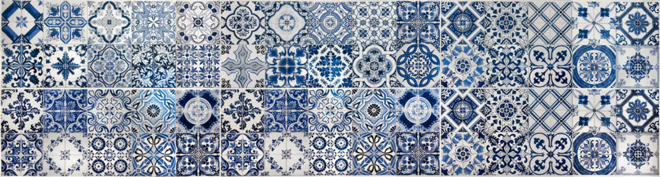 Geometric and floral azulejo tile mosaic pattern. Portuguese or Spanish retro old wall tiles. Seamless navy blue background. Decorative ornamental ceramic design elements, panoramic photo.