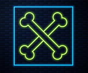 Glowing neon line Crossed human bones icon isolated on brick wall background. Vector.