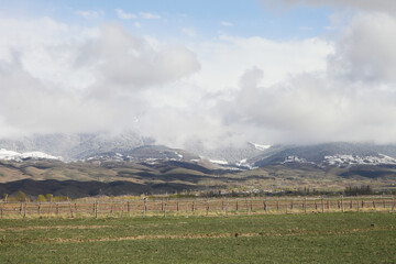 Fototapeta premium Beautiful mountain landscape. Wildlife Kyrgyzstan. Clouds in the sky. Kyrgyzstan