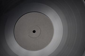 12-inch LP vinyl record with blank black label.