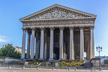 Obraz premium Eglise de la Madeleine, one of most famous churches of Paris, France. Madeleine Church designed in its present form as a temple to the glory of Napoleon's army.