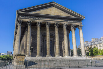 Naklejka premium Eglise de la Madeleine, one of most famous churches of Paris, France. Madeleine Church designed in its present form as a temple to the glory of Napoleon's army.