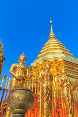 Fototapeta na wymiar Beautiful northern Thai style architectural of golden pagoda and golden Buddha Image at Wat Phra That Doi Suthep, the famous temple and became the landmark of Chiang Mai, Thailand.