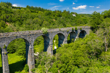 Fototapeta na wymiar Aerial view of Pontsarn Viaduct near Morlais and Merthyr Tydfil in South Wales. The viaduct is now part of the Taff Trail walking and cycle network