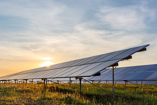 ground mounted photovoltaic power station at sunset