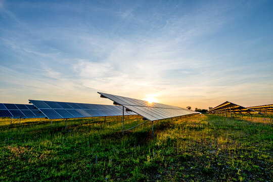 ground mounted photovoltaic power station at sunset