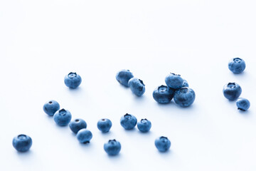 Group of fresh juisy blueberries isolated on white background