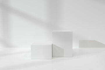 White cubic podium on the floor, 3d rendering.