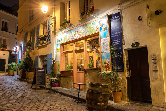 Paris, France-02 may 2018 : The French traditional cafe Poulbot located in Montmartre area at night.