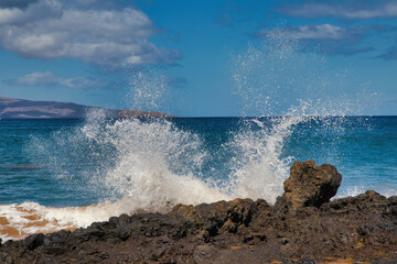 Crashing wave at secret beach on Maui.