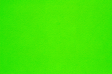 Bright green fleecy textile structured background for design
