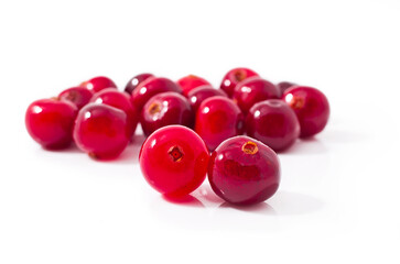Heap of cranberries isolated on a white background.