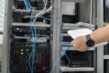 The network system administrator  works in the server room of the data center. 