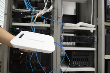 The network system administrator  works in the server room of the data center. 