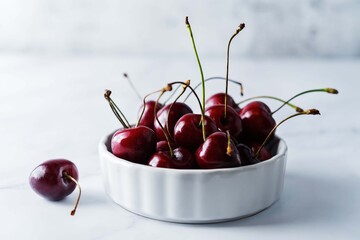 Raw fresh cherries on a light background