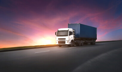 Close-up view Container truck transportation driving on the highway road at beautiful sky time.