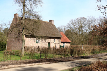 Fototapeta na wymiar Typical, ancient and historical farmhouse in a rural landscape, Bokrijk, Belgium