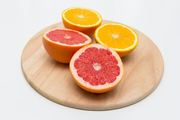 Naklejka na ściany i meble grapefruit on a wooden background
