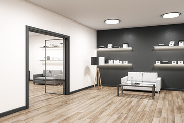 Modern living room with shelf with books and white sofa.