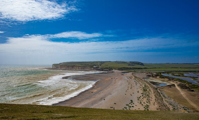 Severn Sisters white cliffs over the ocean, Cuckmere, in the South Downs National Park, East Sussex, UK