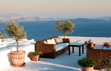 Fototapeta na wymiar Roof garden cafe restaurant at Santorini island in the Aegean sea in Greece
