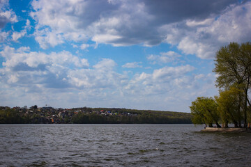 Cloudy Sky Above The Lake On A Windy Day