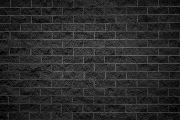 Plakat black brick wall, rough masonry wall of black raw brick