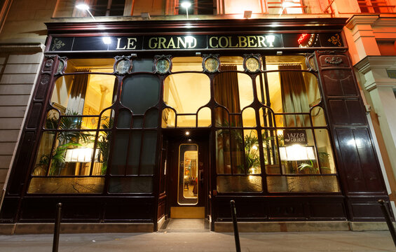 Paris, France -November 04 , 2019 : The famous brasserie Grand Colbert at night . It is situated in the heart of the 2nd district in Paris which borders the Palais Royal gardens.