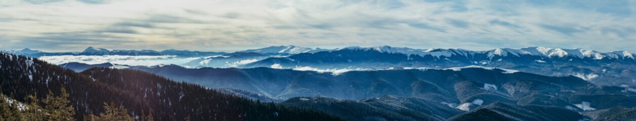 Fototapeta na wymiar A view of a snow covered mountain