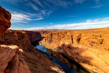 Fototapeta na wymiar Endless desert landscape seen with red rocks, near Colorado river, Page, AZ, USA