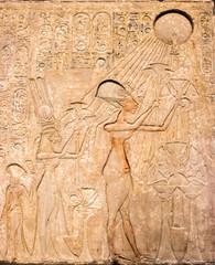 Fototapeta na wymiar Pharaoh Aquenáton and his family worshiping Aton. (1353 BC)