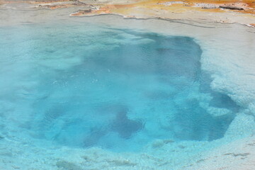 Abyss Pool, clear profoundly deep blue hot spring pool. (West Thumb Geyser Basin, Yellowstone...