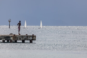 Two sailboats and brewing storm, Saint Vincent and the Grenadines